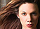 Woman with brown hair and highlights