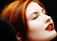 Woman with red hair and highlights